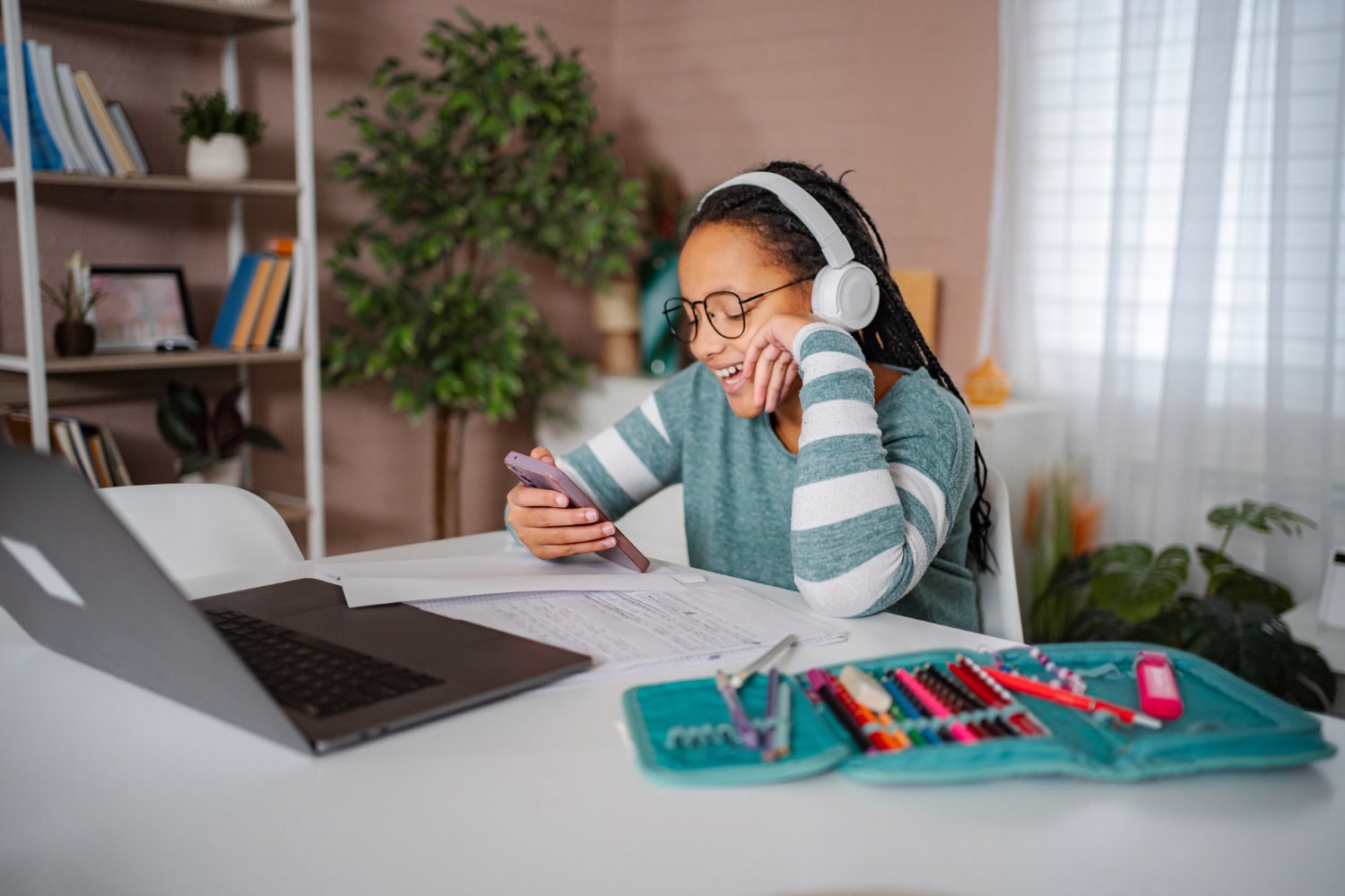Kid enjoying writing her feelings